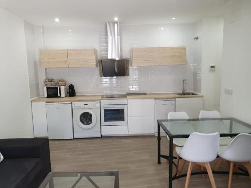 Kuchyň nebo kuchyňský kout v ubytování Apartamentos Balcón de la Vega