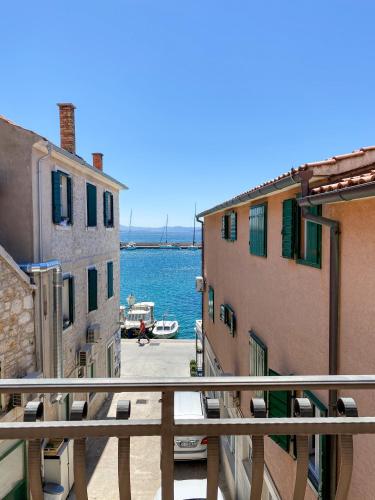 a view of the water from an apartment balcony at Villa Adria in Vodice
