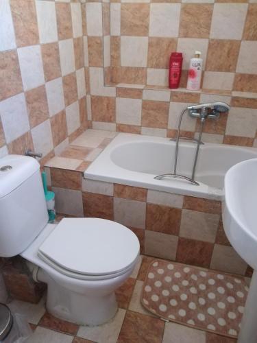 Un baño de Hermes Apartment -1