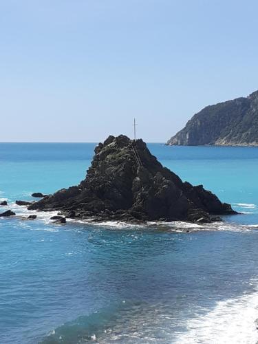 a small island in the middle of the ocean at Asseu in Sestri Levante