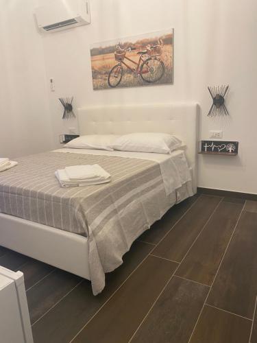 Postel nebo postele na pokoji v ubytování B&B Libertà