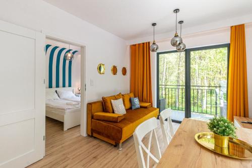 Postel nebo postele na pokoji v ubytování Apartamenty Sailor