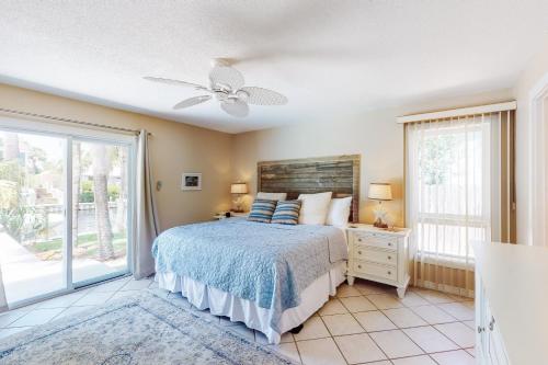 a bedroom with a bed and a large window at Wahoo 535 at Bay Point in Panama City Beach