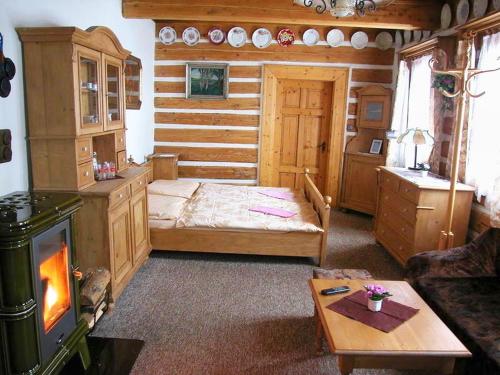 Postel nebo postele na pokoji v ubytování Lovecká chata