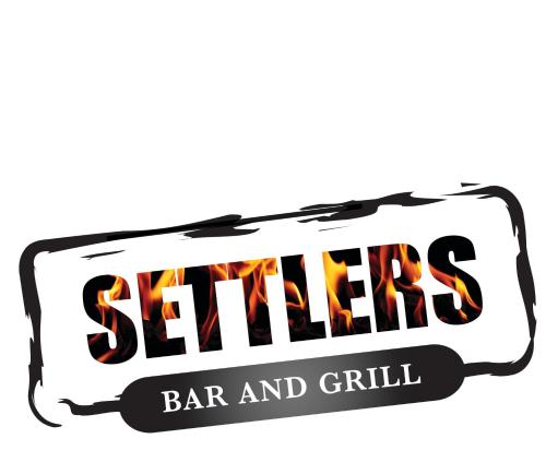 a grill sign with the words skills bar and grill at Discovery Settlers Hotel in Whangarei