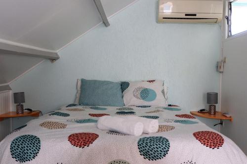 Postel nebo postele na pokoji v ubytování La porte bleue