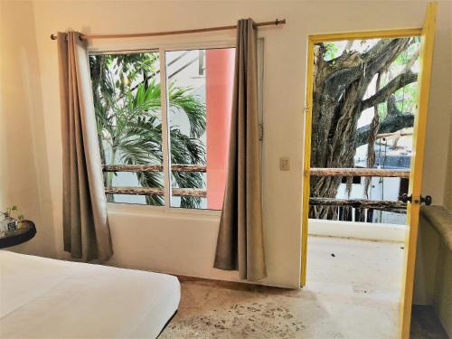 Rustik-Inn Rooms en Playa del Carmen