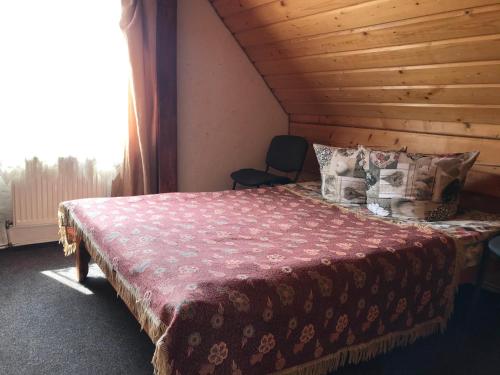Voodi või voodid majutusasutuse Karpatski spohady toas