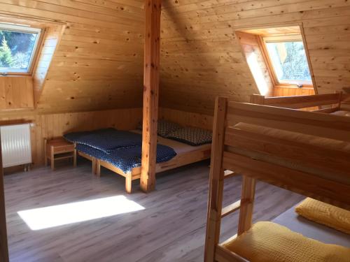 Llit o llits en una habitació de penzion Stará Škola