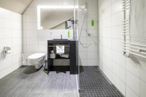 Ванная комната в JOESEPP´S HOTEL am Hallhof
