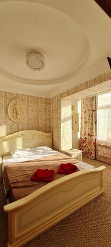 Кровать или кровати в номере Апартаменты на Навагинской
