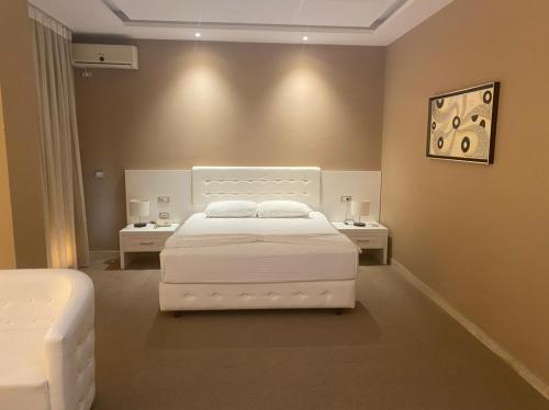 Postel nebo postele na pokoji v ubytování Hotel Continental