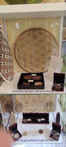a shelf with several boxes of chocolate on it at White Tower of Love in Bressanone