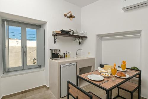 Una cocina o zona de cocina en Venetian Suites II