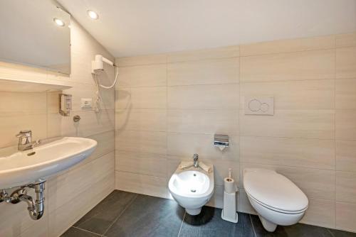 Koupelna v ubytování Residence Condor Apt Gitschberg
