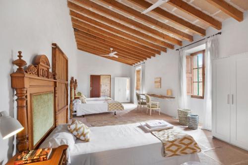 Postel nebo postele na pokoji v ubytování Villa Santanyí, Sueño de Verano
