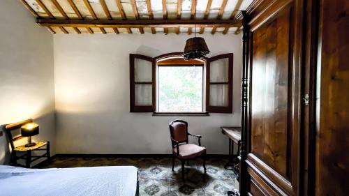 Llit o llits en una habitació de Arte Povera Landhaus in idyllischem Naturreservat
