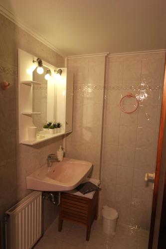 A bathroom at COZY APARTMENT IN THE HEART OF THE TOWN