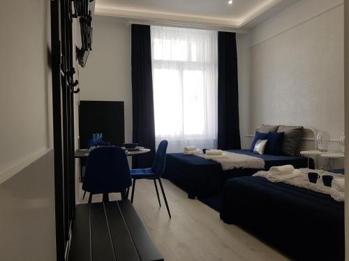 Voodi või voodid majutusasutuse Budapest Holidays Harmony toas