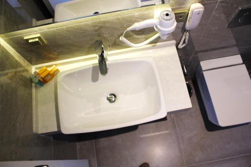 Een badkamer bij YURDAKUL HOTEL