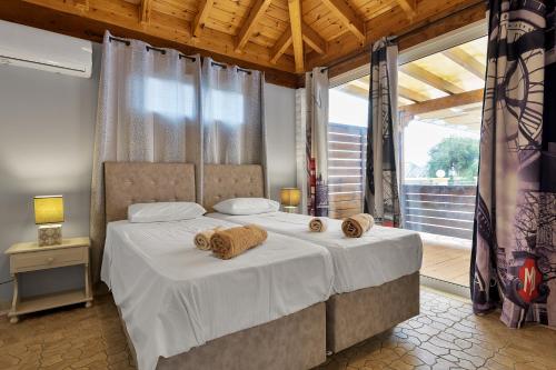 A bed or beds in a room at Fotini Studios