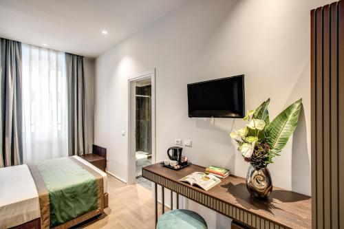 Et tv og/eller underholdning på Hotel 77 Seventy-Seven - Maison D'Art Collection