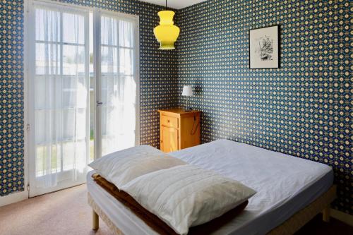 Postel nebo postele na pokoji v ubytování Maison pour 4 - Jardin - 400m plage des Lutins