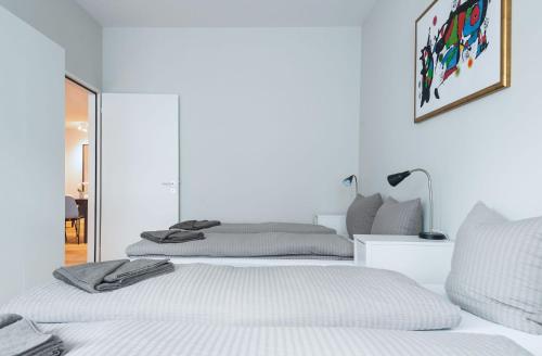 Letto o letti in una camera di HITrental Marktplatz Apartments