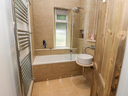 Kylpyhuone majoituspaikassa Sunnyside Villa