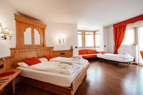 Postel nebo postele na pokoji v ubytování Residence La Moretina