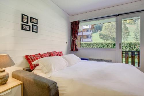 Postel nebo postele na pokoji v ubytování Atray R3 Studio - Snow and Trek - Morzine