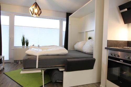 Ένα ή περισσότερα κρεβάτια σε δωμάτιο στο Kirchweg 9 Auszeit 2