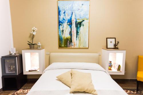 Una cama o camas en una habitación de Ai Vicerè