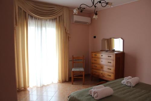 Postel nebo postele na pokoji v ubytování La Collina