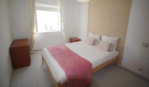 Ένα ή περισσότερα κρεβάτια σε δωμάτιο στο Apartamentos Cuberris