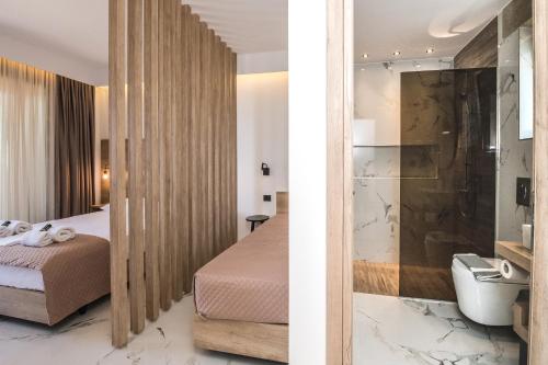 エラフォニシにあるXasteriaのベッドルーム1室(ベッド1台付)、バスルーム(シャワー付)が備わります。