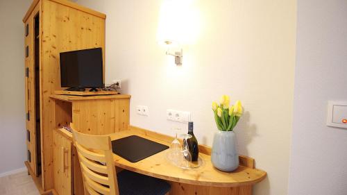 Aparthotel Alte Schmiede Dettelbachにあるキッチンまたは簡易キッチン