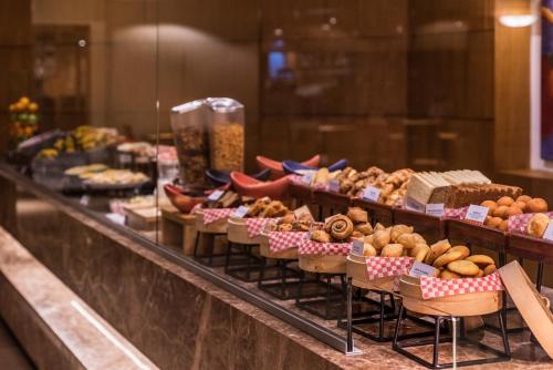 a buffet line with many different types of food at Hotel Intercontinental Cali by IHG in Cali