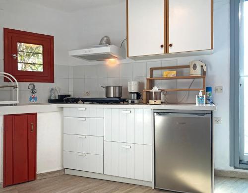 Kuchyň nebo kuchyňský kout v ubytování Mykonos Love Nest