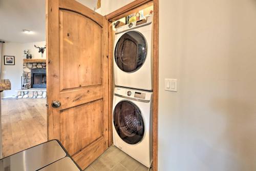 a laundry room with two washer and dryer at Trail Access Pet-Friendly Cabin in Show Low! in Show Low