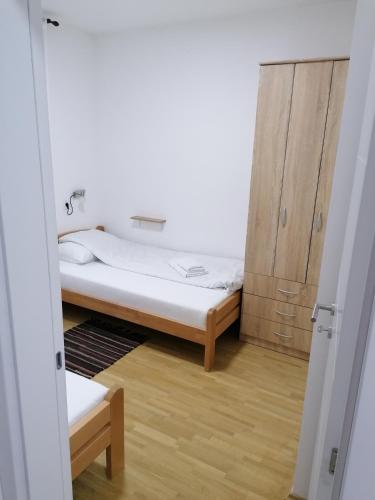 Cama o camas de una habitación en Apartman Ana 3