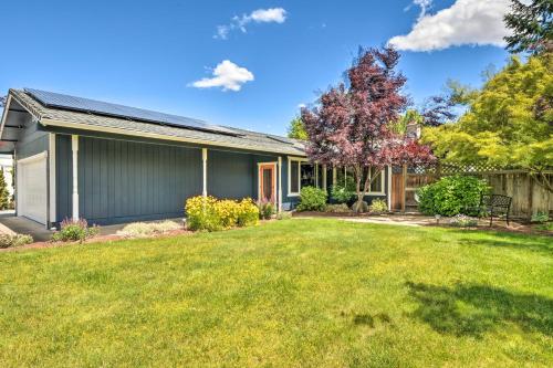 a house with a yard in front of it at Central Medford Family Retreat with Large Yard! in Medford