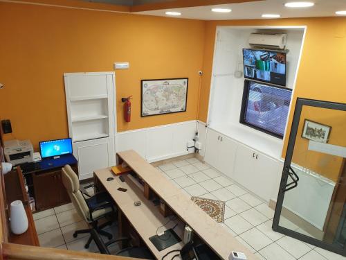 TV a/nebo společenská místnost v ubytování Hotel Milano