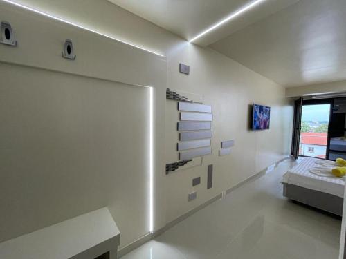 Katil atau katil-katil dalam bilik di Jxn Rooms