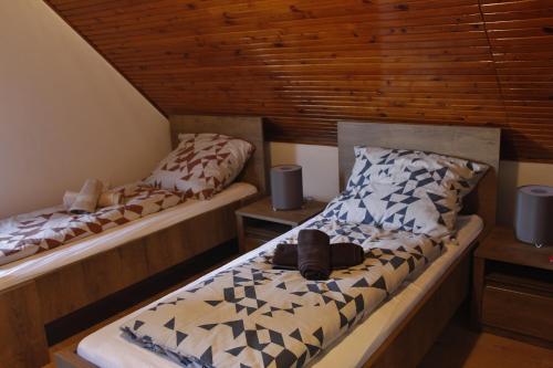 Ένα ή περισσότερα κρεβάτια σε δωμάτιο στο Széchenyi Vadászház