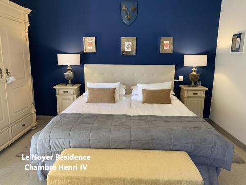 Postel nebo postele na pokoji v ubytování Le Noyer Résidence B&B