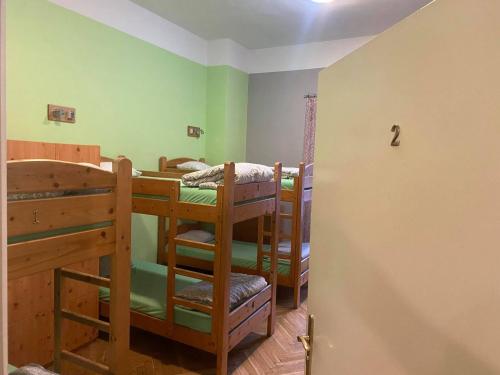 A bunk bed or bunk beds in a room at 50 People Apartment