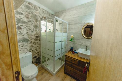 Ett badrum på Magnolias Cottage