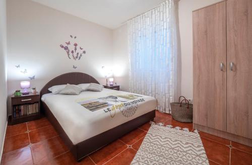 Katil atau katil-katil dalam bilik di Casa al mare Petrovac, Montenegro