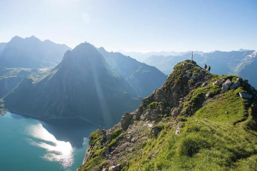 a group of people standing on top of a mountain at Ferienwohnung Wallner in Wald am Arlberg